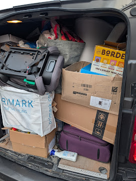 Emerald Logistics van packed with boxes and furniture for delivery