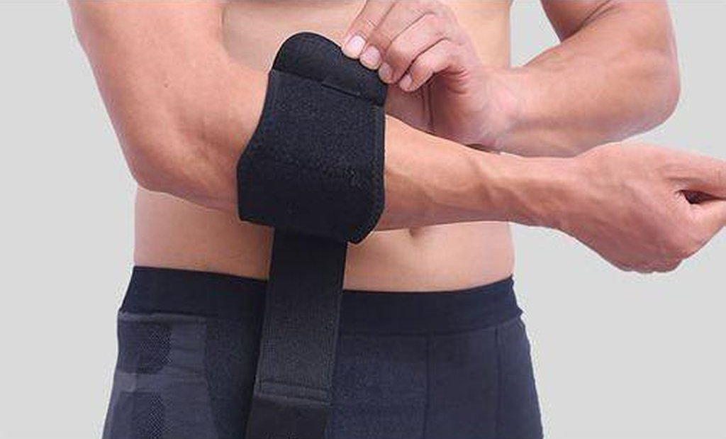 Elbow support worn on the forearm
